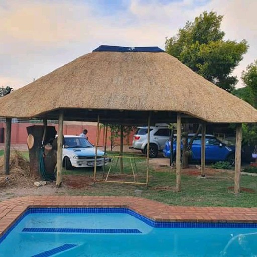 Emmanuel thatching and swimming pools Pty ltd Logo